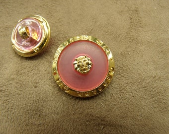 Acrylic button - gold on hot pink background
