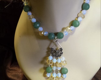 One strand beaded faceted jade, opulite, citrine necklace with center drops