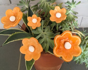 White ceramic and enamel orange flowers