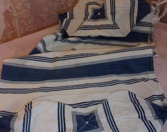 A blue Duffel or old pillow ticking striped cover
