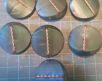 7 black and metal buttons from the 1960's