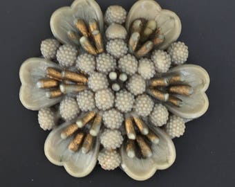 Unique vintage celluloid flower brooch