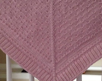 Very warm Aran weight 100 percent merino wool shawl with removable broach closure.