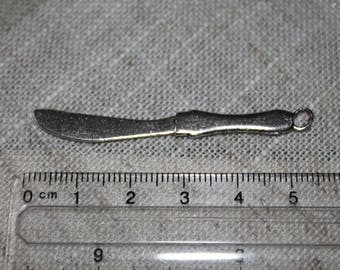Silver knife charm
