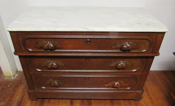 Antique dresser with marble top and secret compartment