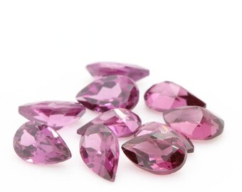 Pink Rhodolite Garnet. IF-VVS1. PEAR. (sold separately). Africa. 4 x 3 mm. SKU005414