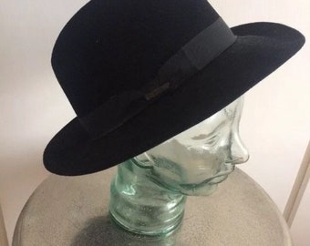 Vintage J B Stetson hat with Stetson pin badge