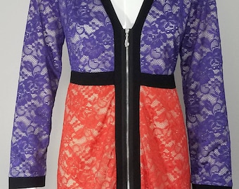 Women's lace color block dress with sleeves.