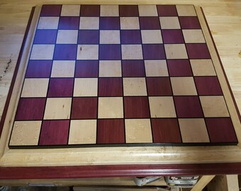 Chessboard made from purple heart,birdseye maple,and gaboon ebony with 2 and a quarter inch squares