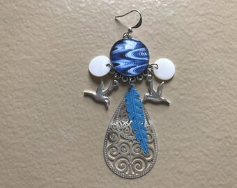 Blue earrings decorated with birds