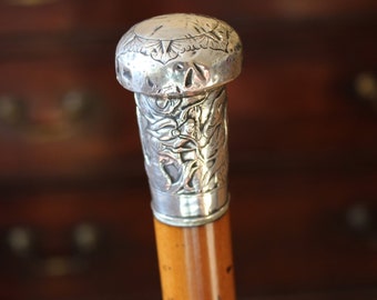 Antique Malacca cane walking cane with chinese repousse silver handle c 1870