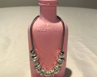 Vintage bottle turned bracelet holder