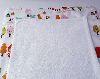 Nomad/mattress Red Riding Hood diaper changing pad.