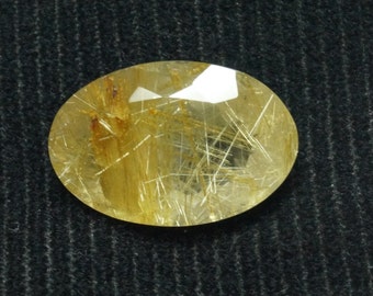 100% Natural Golden Rutilated Quartz Gemstones Faceted oval with gold needles Size 22x14.50x9mm