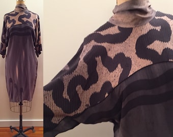 Sophisticated & crafty silk brown tones batik tunic with tie neck