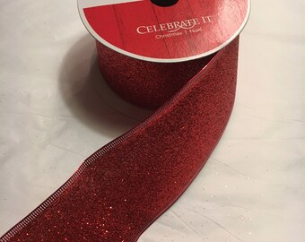 Red glitter ribbon w/wired edge 2.5 inches wide, each roll is 25 ft. long