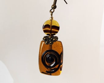 Earrings black ribbed amber glass beads