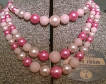 Vintage pink plastic pearl necklace and earrings