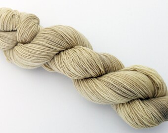 Natural plant dyed Polwarth sock yarn. Dyed with goldenrod shoots. Spun + superwash treated in the UK. 85:15 Polwarth/nylon