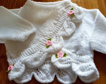 Hand knit cardigan for a new born