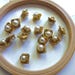 beautiful square button component, frieze in the Center gold metal faux Pearl embedded dimensions 1.2 cm. Different lots of variations.
