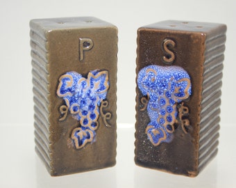 Vintage salt and pepper shakers ceramic with grape embossed towers