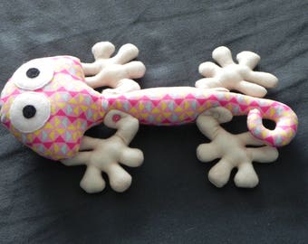 little lizard pink with white paws off