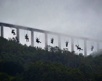 Illustration of people swinging on bridge photography.