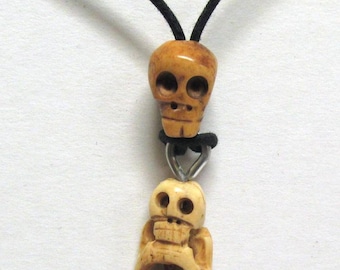 Unusual Handmade Bone Crouching Skeleton on a Bone Skull Necklace 01
