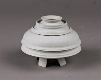 Porcelain Jar Inspired by Books and Time