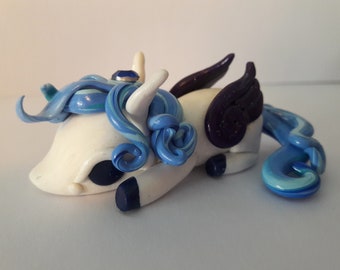 Cute pegasus sleepy pony sculpture