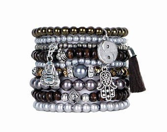 Beaded Bracelets Set of 9 Stretch Bracelets Bohemian Buddha Themed Stack with Silver Tone Charms