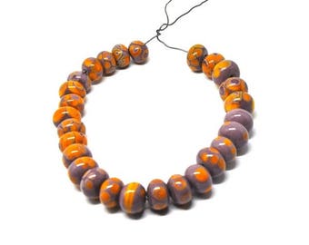 27 orange/violet lampwork beads