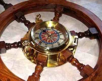 Steering wheel 60 cm with ship's clock windrose 18 cm- very massive and heavy- 6000 g