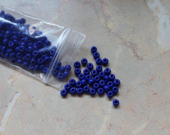 Large seed beads in opaque dark blue color. 4.5 mm