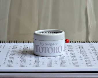My Neighbor Totoro inspired music box. Hand cranked music mechanism with the main theme of the film, perfect for the fans of the film.