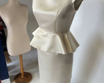 Ivory dress with peplum, size 10