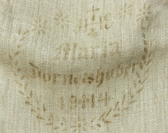 Antique timeworn grainsack floursack printed dates 1914 faded print herringbone grainsack tablerunner upholstery project cushions