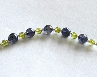 Beautiful 11 beads of Iolite and Peridot for a total of nearly 12 carats