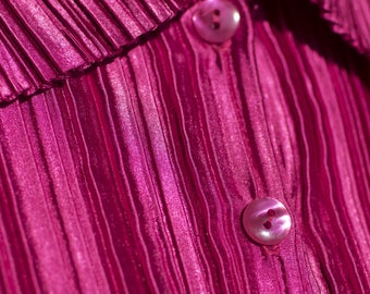 Vintage laminated blouse with accordion pleats