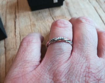 Twisted copper and silver entwined ring