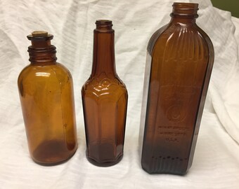 lot of 3 vintage amber bottles