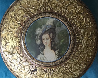 A Vintage Repousse Biscuit Tin - Huntley and Palmer