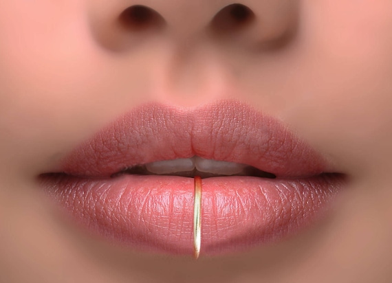 Lip rings hoops Lip Rings Whatever lip piercing you have - whether it be a pair of snakebites or the single stud medusa - you've come to the right place to find your lip piercing jewelry needs.