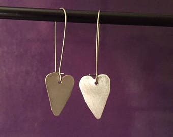 Sweet Hearts dangling from a sterling silver wire