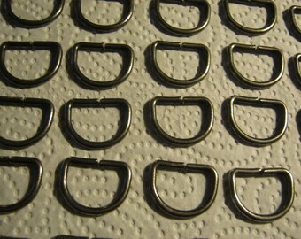 100 pieces of D-rings, (Dekoringe), Metal, CA. Length 26 mm, height approx. 20 mm, new, Button manufactory