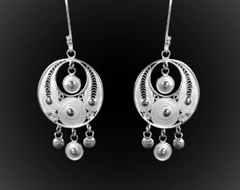 Eclipse earrings in silver embroidery