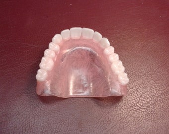 Upper Lower denture for finish. (Partial payment 300 owed)