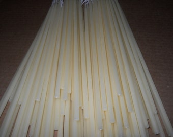 4 Beeswax candles (2 pairs) 3/8" X 18" Long hand dipped Creamy Color.