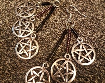 Black and purple cluster earrings with silver pentagrams